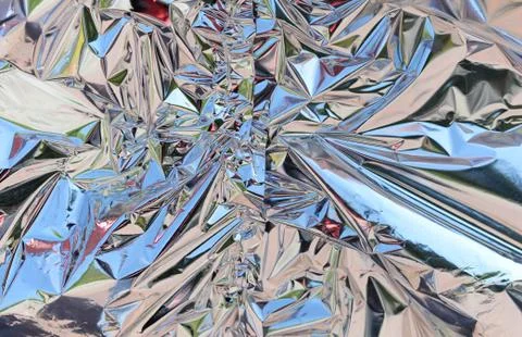 Foil material background glitters Stock Photos