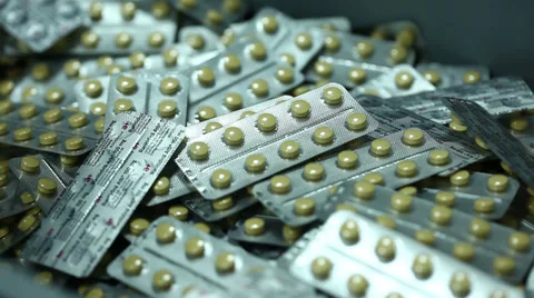 Foil packages with pills Stock Footage 36634786