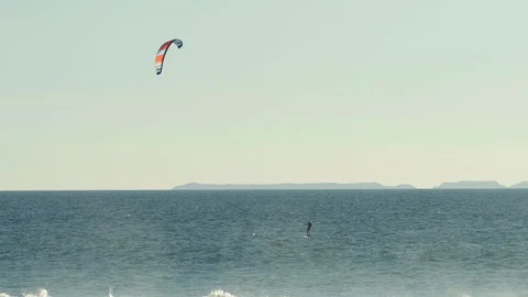 Foil surfing on the ocean in slow-motion Stock Footage 88283528