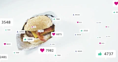 Foil-wrapped burger entering frame, hearts and likes floating, counts growing, Stock Footage 334112465