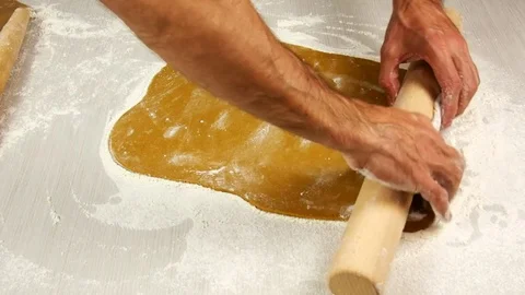 Fold edge of pastry round over rolling pin. Stock Footage 77225270