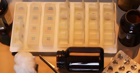 Fold tablets into boxes for daily use Stock Footage 102626667