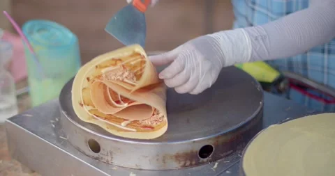 Fold them into triangles and serve. Stock Footage 223381497