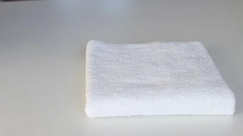 Fold towels on white table Stock Footage 59827520
