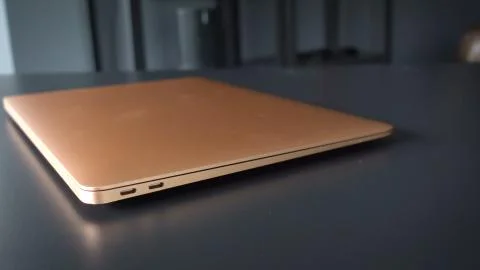 Foldable laptop computer in workplace Stock Photos