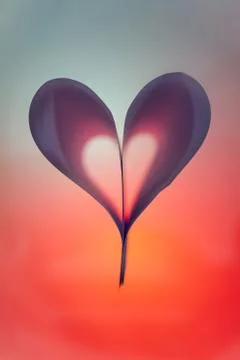 Folded backlit paper abstract heart shape suitabe as wallpaper. Stock Illustration