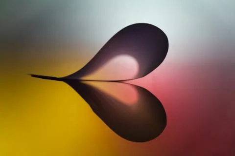 Folded backlit paper abstract heart shape suitabe as wallpaper. Stock Illustration