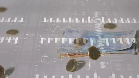 Folded banknotes receiving released coins falling and settling while charts Stock Footage 328657229