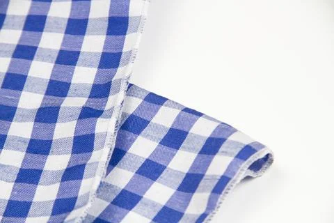 Folded blue and white checkered cotton Stock Photos