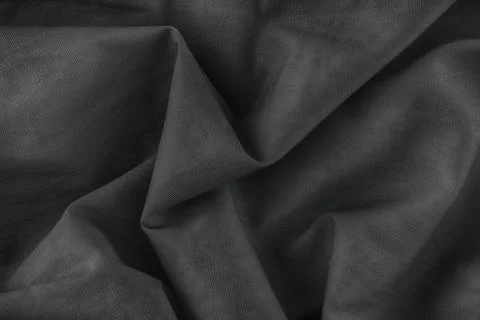 Folded fabric texture background. Black and white Stock Photos