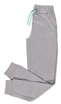 Folded gray jogging pants. Isolated image on a white background. Stock Photos