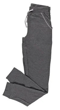 Folded gray jogging pants. Isolated image on a white background. Stock Photos