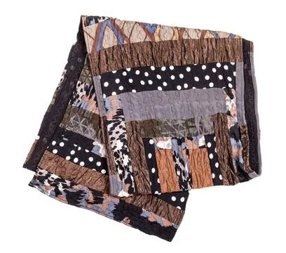 Folded handmade brown patchwork scarf isolated folded handmade brown patch... Stock-Fotos
