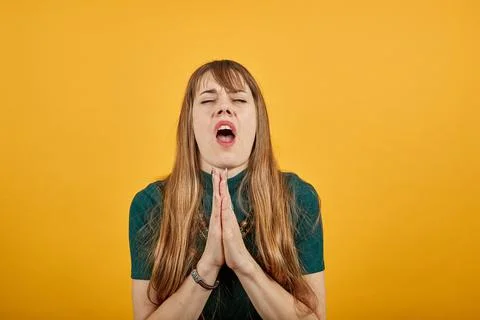 Folded hands together praying asking God help ask implore wish upwards Jesus Stock Photos