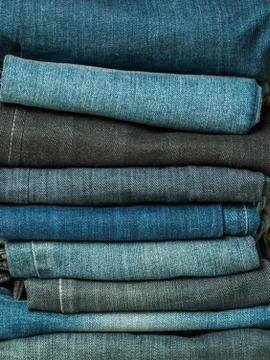 Folded jean stack close up Stock Photos