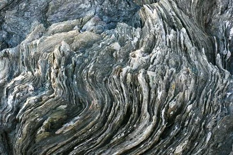 Folded Metamorphic Rock Formation at Kvalsvik, Norway 스톡 사진