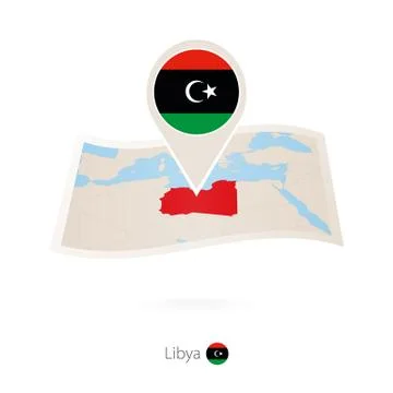 Folded paper map of Libya with flag pin of Libya. Stock Illustration