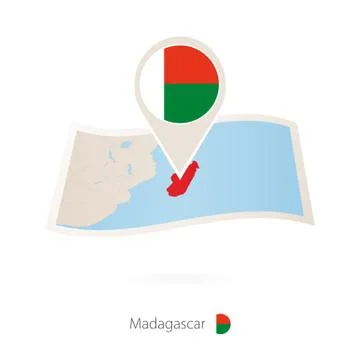 Folded paper map of Madagascar with flag pin of Madagascar. Stock Illustration