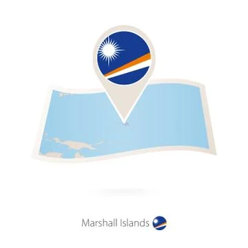 Folded paper map of Marshall Islands with flag pin of Marshall Islands. Stock Illustration