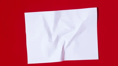 Folded paper sheet becomes smooth Stock Footage 120137094