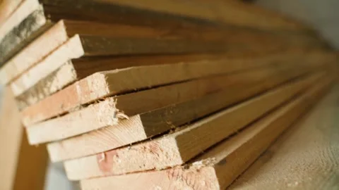 Folded pine boards close-up, even end cut. Smooth camera movement Stock Footage 247639715