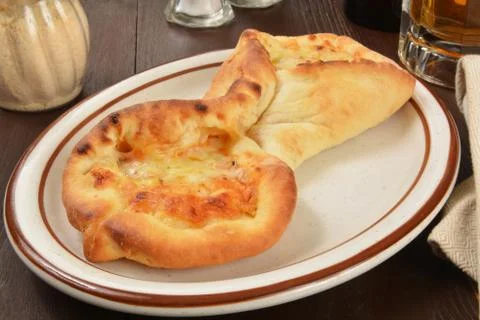 Folded pizza with beer Stock Photos