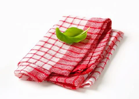 Folded red and white checkered cloth with lime Foto stock