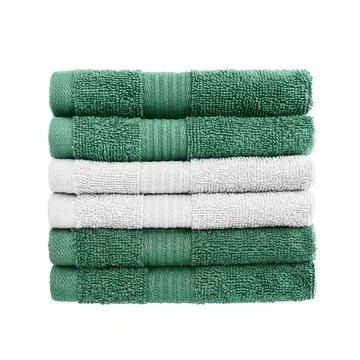 Folded in stack green and gray towels isolated over white background with Stock Photos