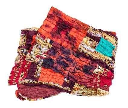 Folded stitched red brown patchwork scarf isolated folded stitched red bro... Fotos de archivo