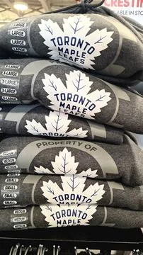 Folded Toronto Maple Leafs grey hoodies stacked together Stock Photos