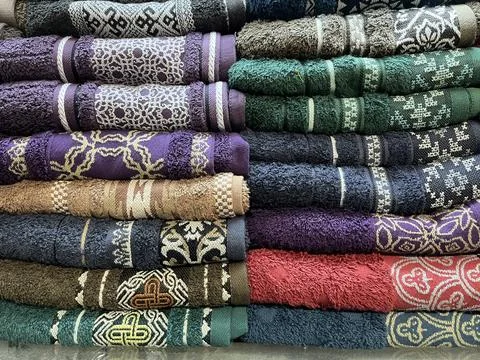 Folded towel with abstract pattern in a store Stock Photos