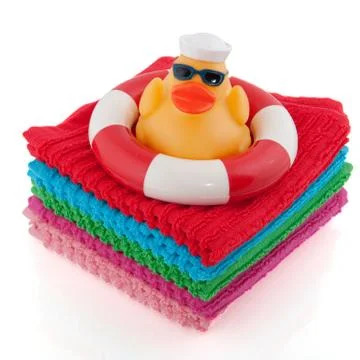 Folded towels with poolside Stock Photos