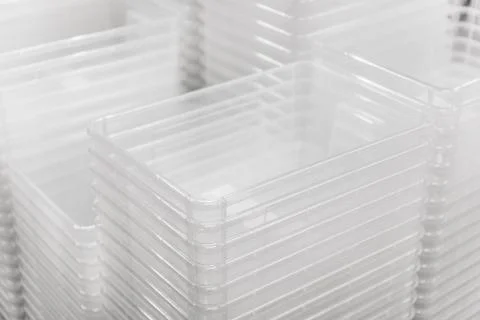 Folded transparent plastic containers boxes at store 写真素材