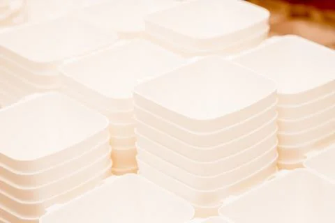 Folded white transparent plastic container.stack of plastic containers, boxes Foto stock
