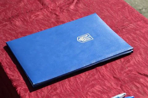 Folder for documents with the coat of arms of Ukraine Stock Photos
