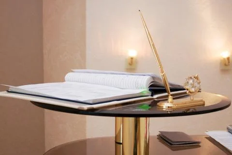 Folder with documents on signing marriage certificate, writing materials. Stock Photos