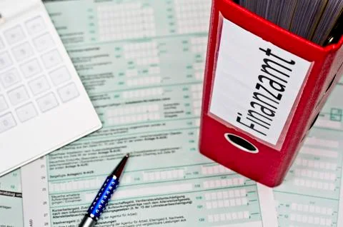 Folder with documents for the tax office Stock Photos