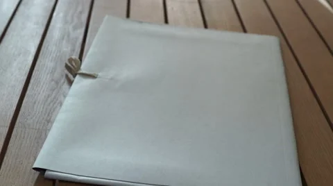 Folder fall on the table Stock Footage 60759945