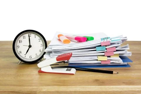 Folder file, glasses and clock on wood table concept Office equipment Photos