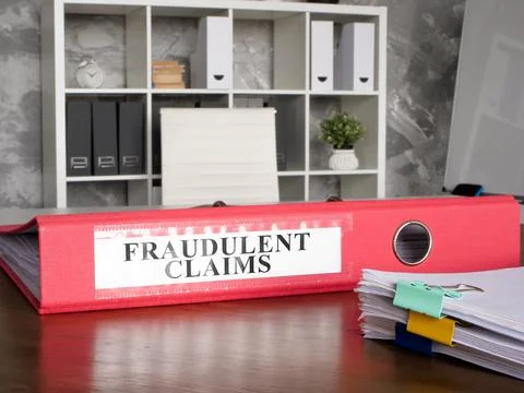Folder with fraudulent claims documents. Stock Photos