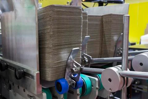 Folder gluer machine for carton box Stock Photos
