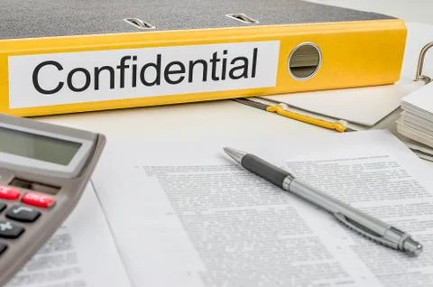 Folder with the label confidential Photos