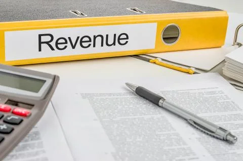 Folder with the label revenue Stock Photos