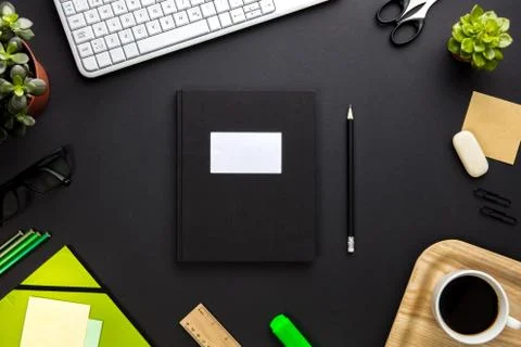Folder With Label Surrounded By Office Equipment On Gray Desk Stock Photos