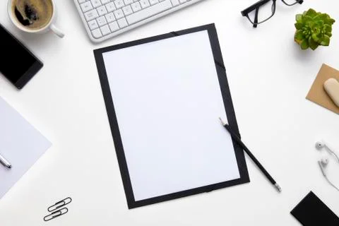 Folder Surrounded With Office Supplies Stock Photos