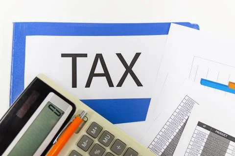 Folder Tax documents and paper files with calculator 스톡 사진