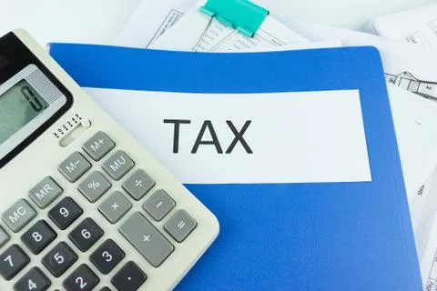 Folder Tax documents and paper files with calculator Photos