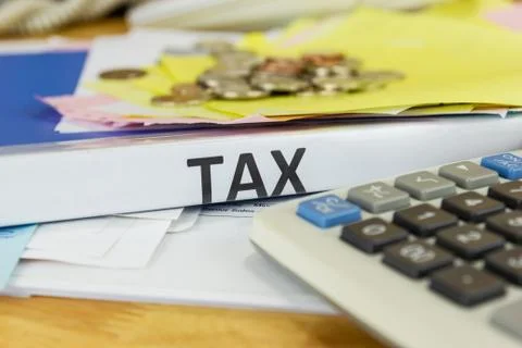 Folder Tax documents and paper files concept Annual tax payment Photos