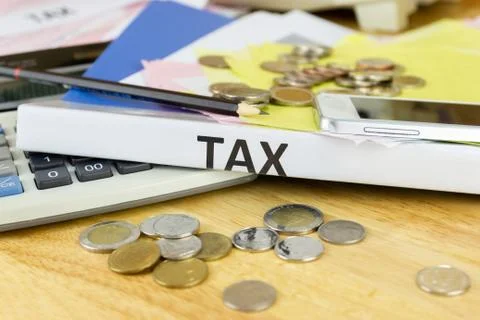 Folder Tax documents and paper files with coin calculator Stock Photos