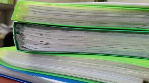 Folders are on the table Stock Footage 118564310